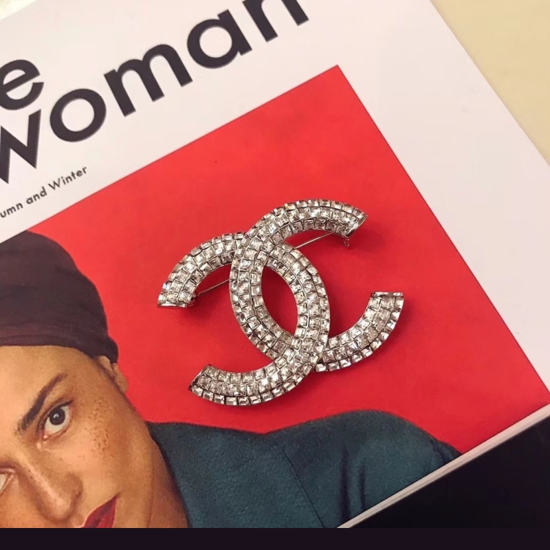 Ch*el brooches